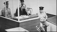 Adolf Eichmann em seu julgamento - Israel Government Press Office via Encyclopedia USHMM